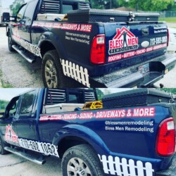 A blue truck from Bless Men Remodeling displaying their services: roofing, gutters, fencing, siding, and driveways. The truck includes contact information and social media handles.